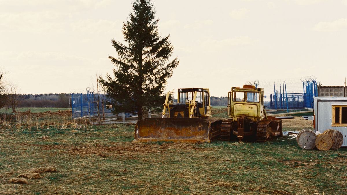 Plant and machinery standing in a holding yard