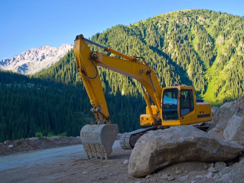 Tracked excavator standing on a working site