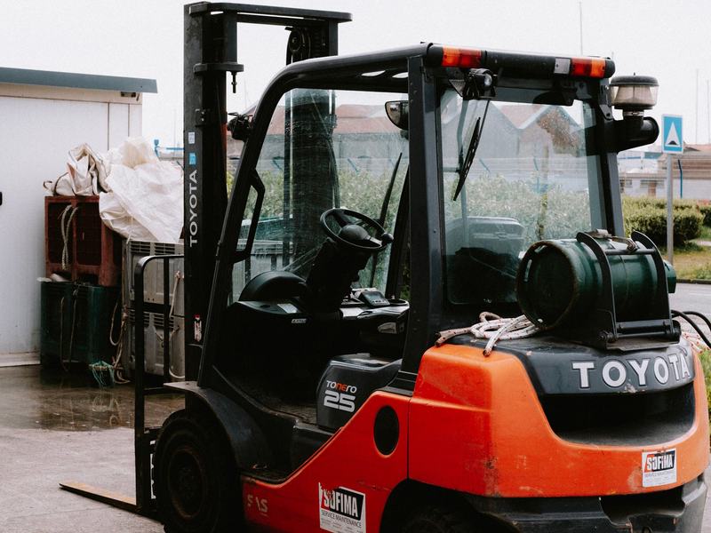 Forklift parked inside a warehouse