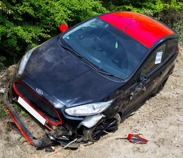 Accident damaged vehicle awaiting salvage disposal