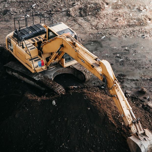 Excavator arm and bucket at rest
