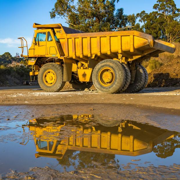Articulated haul truck on a mine haul road