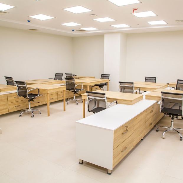 Office desks and seating in an open workspace